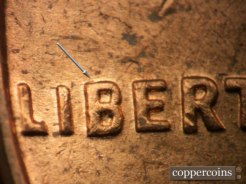 Die-stage B marker on 1963D•1MM•031 (1963 Repunched Mint Mark).