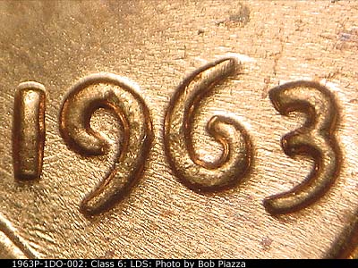 Die-stage C marker on 1963P•1DO•002 (1963 Doubled Die Obverse).