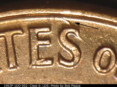 Die-stage C marker on 1963P•1DO•002 (1963 Doubled Die Obverse).