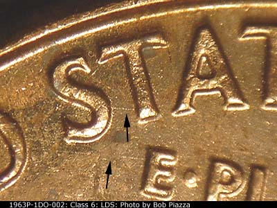 Die-stage C marker on 1963P•1DO•002 (1963 Doubled Die Obverse).