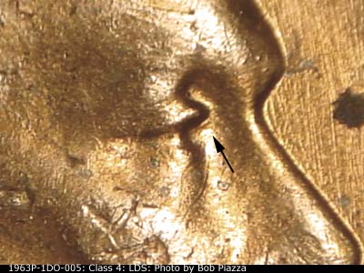 Die-stage C marker on 1963P•1DO•005 (1963 Doubled Die Obverse).
