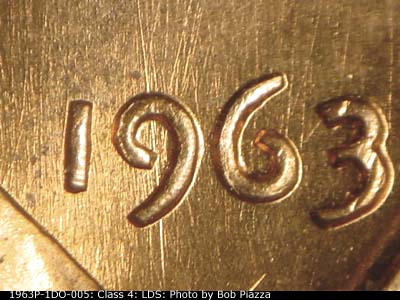 Die-stage C marker on 1963P•1DO•005 (1963 Doubled Die Obverse).