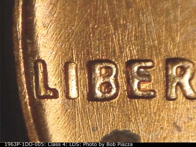 Die-stage C marker on 1963P•1DO•005 (1963 Doubled Die Obverse).