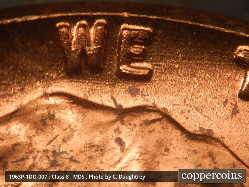 Die-stage B marker on 1963P•1DO•007 (1963 Doubled Die Obverse).