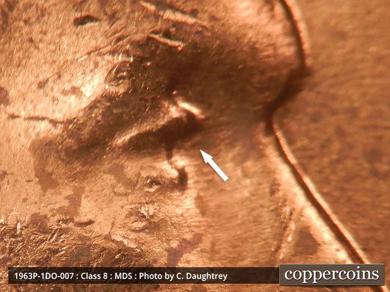 Die-stage B marker on 1963P•1DO•007 (1963 Doubled Die Obverse).
