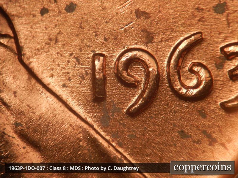 Die-stage B marker on 1963P•1DO•007 (1963 Doubled Die Obverse).