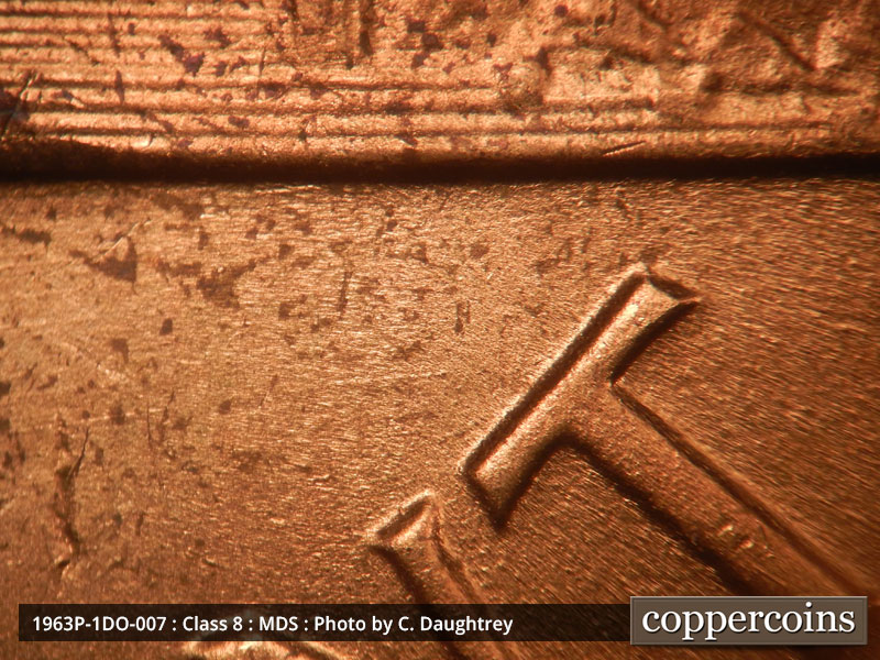 Die-stage B marker on 1963P•1DO•007 (1963 Doubled Die Obverse).