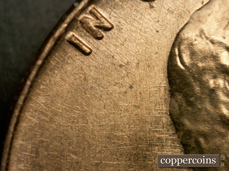 Die-stage A marker on 1963P•1DO•008 (1963 Doubled Die Obverse).