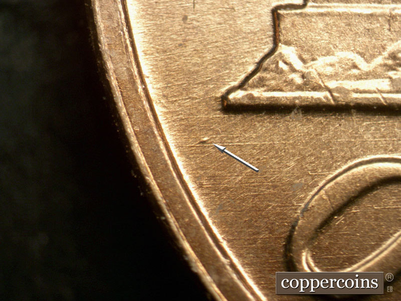 Die-stage A marker on 1963P•1DO•008 (1963 Doubled Die Obverse).