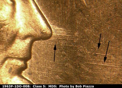 Die-stage B marker on 1963P•1DO•008 (1963 Doubled Die Obverse).