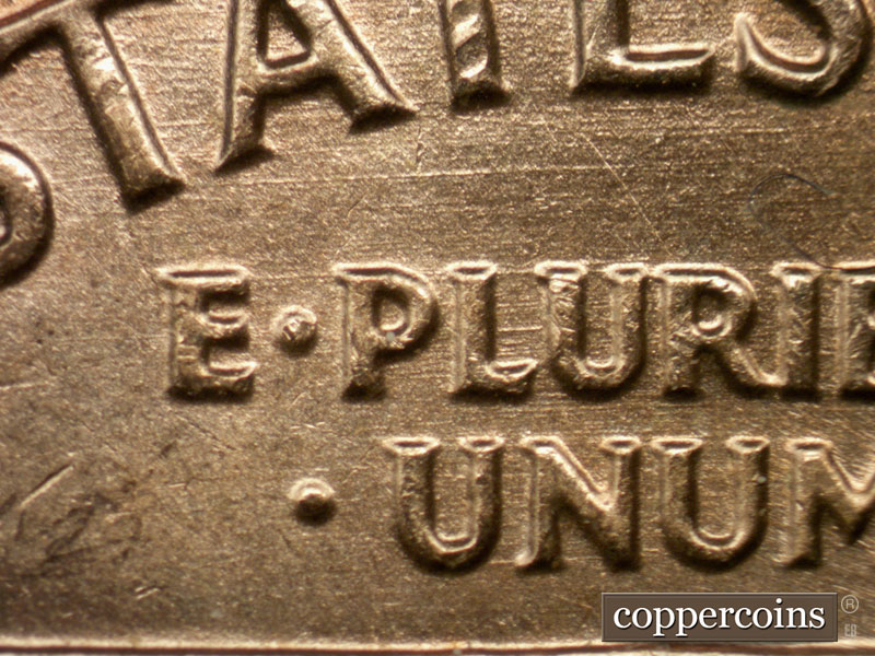 Die-stage B marker on 1963P•1DO•009 (1963 Doubled Die Obverse).