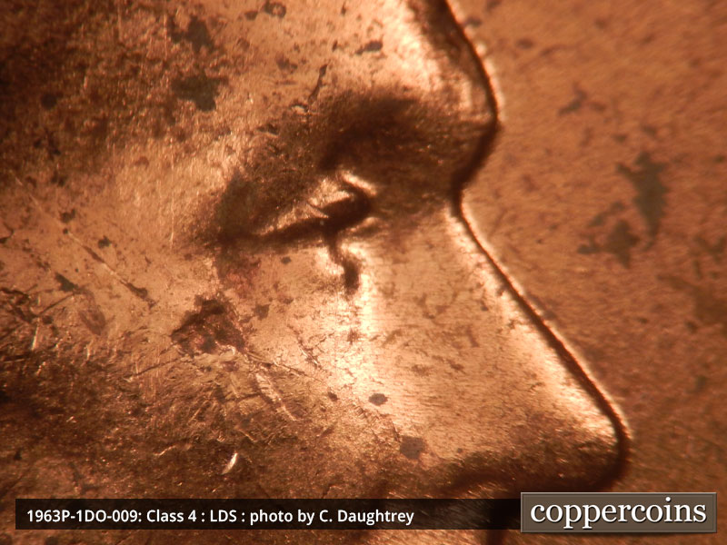Die-stage C marker on 1963P•1DO•009 (1963 Doubled Die Obverse).