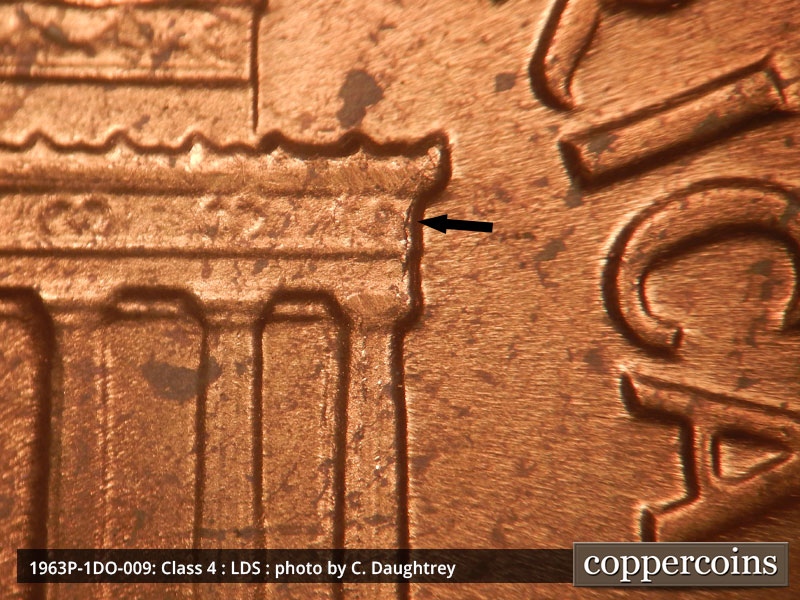 Die-stage C marker on 1963P•1DO•009 (1963 Doubled Die Obverse).