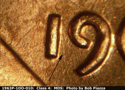 Die-stage B marker on 1963P•1DO•010 (1963 Doubled Die Obverse).