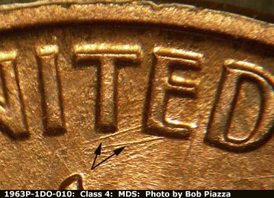 Die-stage B marker on 1963P•1DO•010 (1963 Doubled Die Obverse).