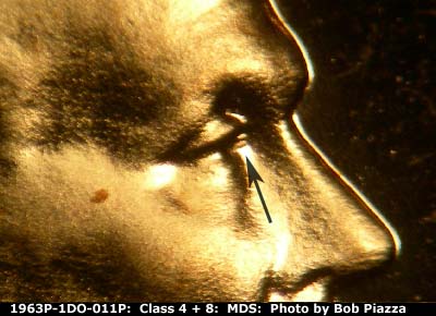 Die-stage B marker on 1963P•1DO•011P (1963 Doubled Die Obverse).
