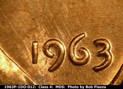 Die-stage B marker on 1963P•1DO•012 (1963 Doubled Die Obverse).