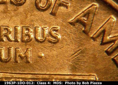 Die-stage B marker on 1963P•1DO•012 (1963 Doubled Die Obverse).