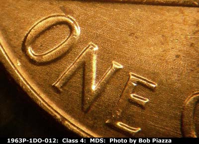 Die-stage B marker on 1963P•1DO•012 (1963 Doubled Die Obverse).