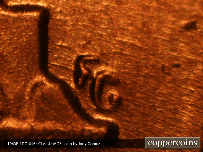 Die-stage B marker on 1963P•1DO•016 (1963 Doubled Die Obverse).