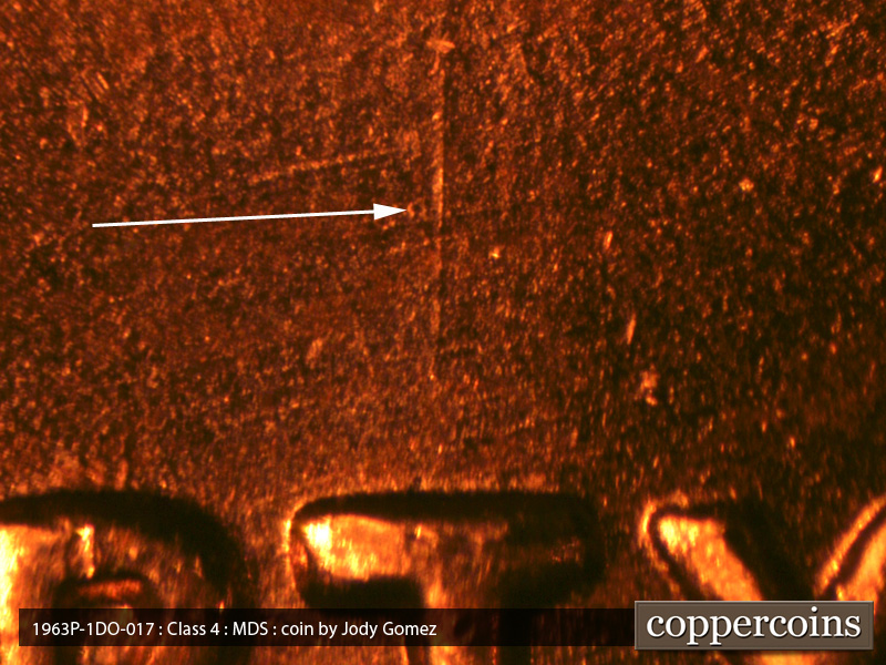 Die-stage B marker on 1963P•1DO•018 (1963 Doubled Die Obverse).