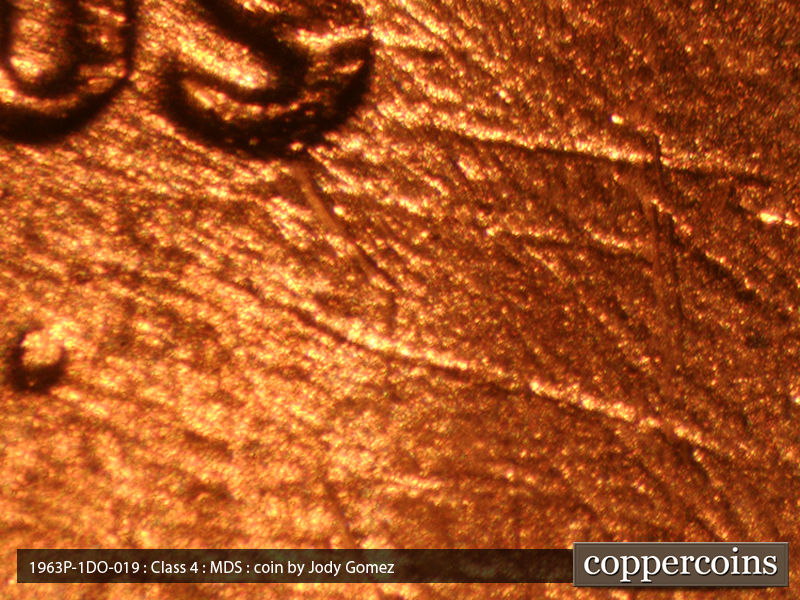 Die-stage B marker on 1963P•1DO•019 (1963 Doubled Die Obverse).