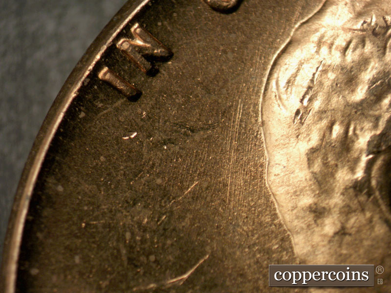 Die-stage A marker on 1963P•1DO•021 (1963 Doubled Die Obverse).