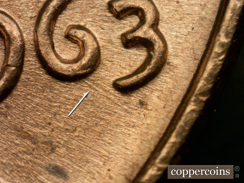 Die-stage B marker on 1963P•1DO•021 (1963 Doubled Die Obverse).