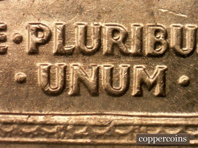 Die-stage B marker on 1963P•1DO•021 (1963 Doubled Die Obverse).