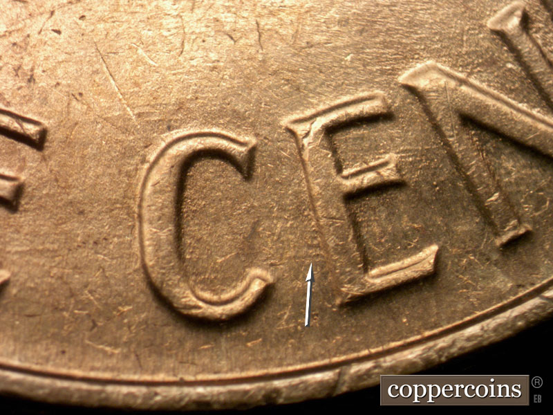 Die-stage B marker on 1963P•1DO•021 (1963 Doubled Die Obverse).