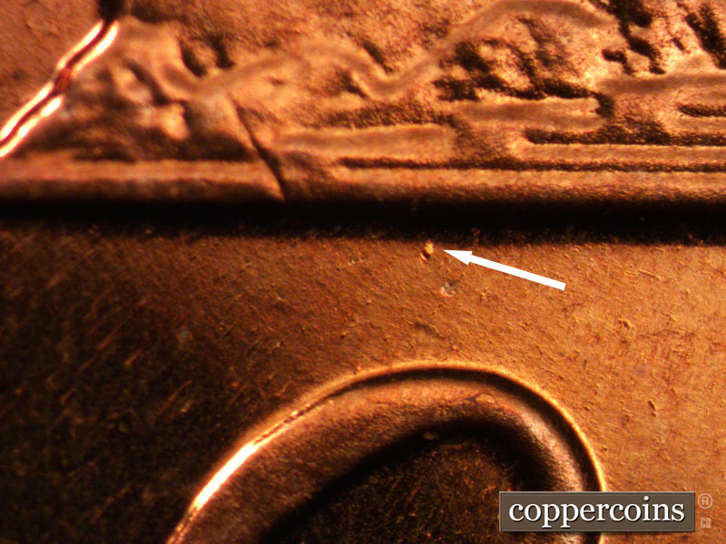 Die-stage B marker on 1963P•1DO•024P (1963 Doubled Die Obverse).