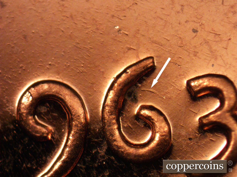 Die-stage B marker on 1963P•1DO•025P (1963 Doubled Die Obverse).