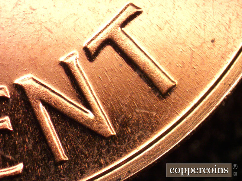 Die-stage B marker on 1963P•1DO•025P (1963 Doubled Die Obverse).