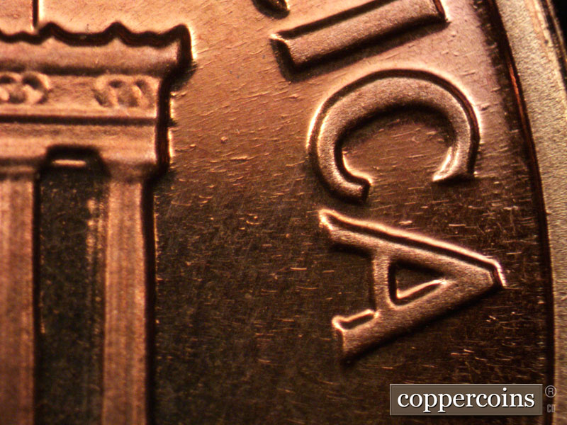 Die-stage B marker on 1963P•1DO•026P (1963 Doubled Die Obverse).
