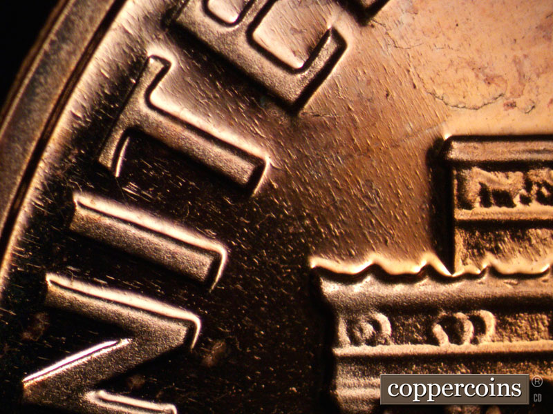 Die-stage B marker on 1963P•1DO•027P (1963 Doubled Die Obverse).