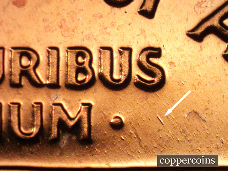 Die-stage B marker on 1963P•1DO•027P (1963 Doubled Die Obverse).