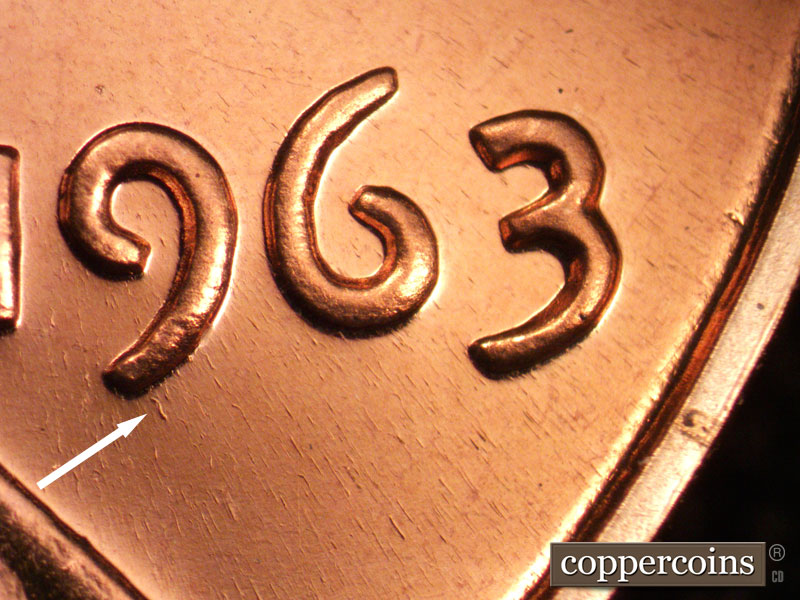 Die-stage B marker on 1963P•1DO•028P (1963 Doubled Die Obverse).