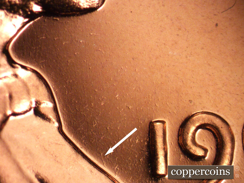 Die-stage B marker on 1963P•1DO•028P (1963 Doubled Die Obverse).