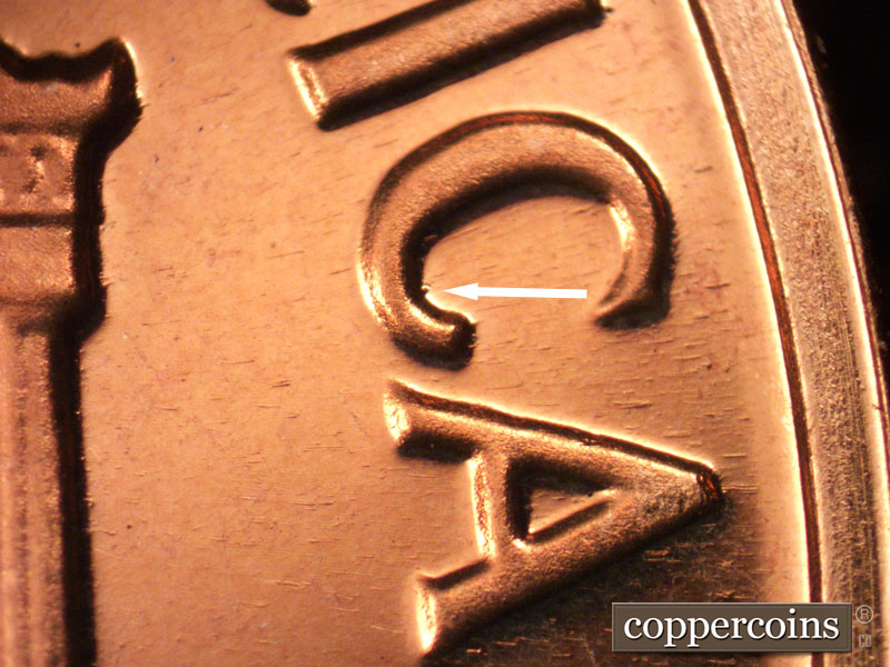 Die-stage B marker on 1963P•1DO•028P (1963 Doubled Die Obverse).