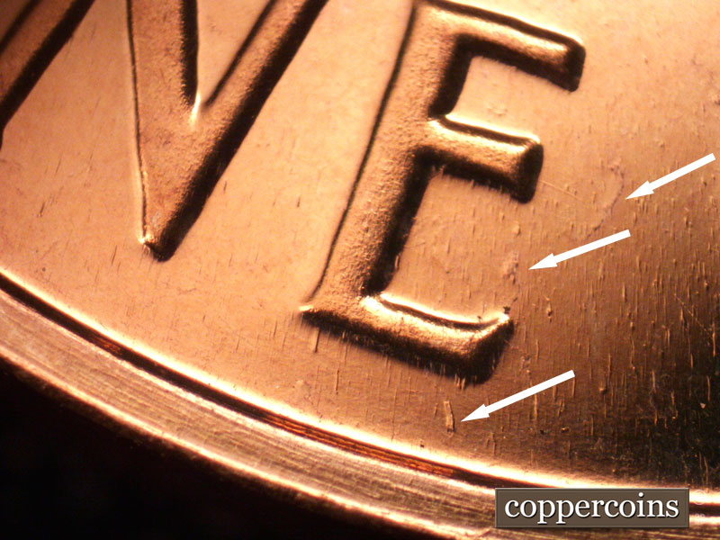 Die-stage B marker on 1963P•1DO•028P (1963 Doubled Die Obverse).