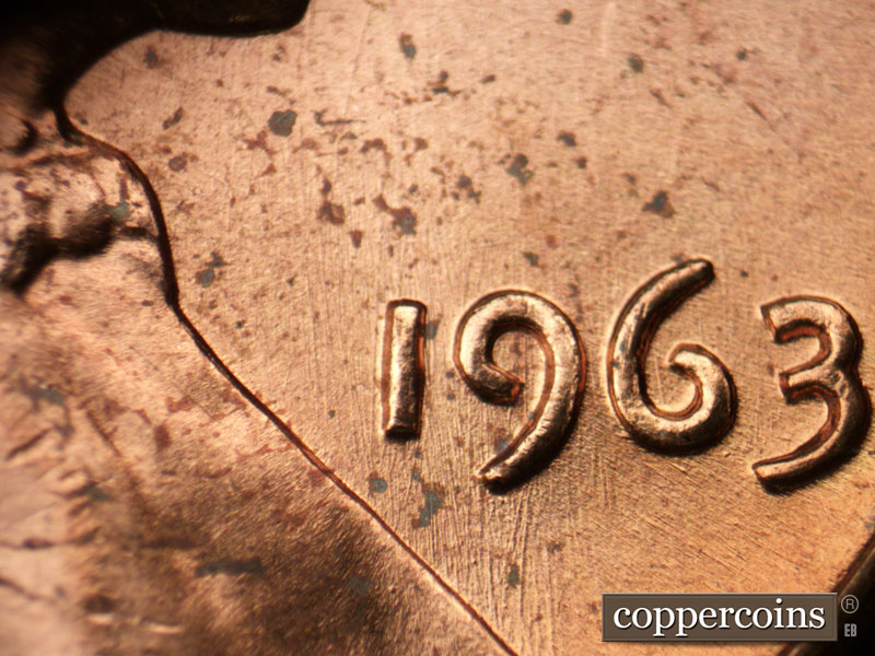 Die-stage B marker on 1963P•1DO•029 (1963 Doubled Die Obverse).
