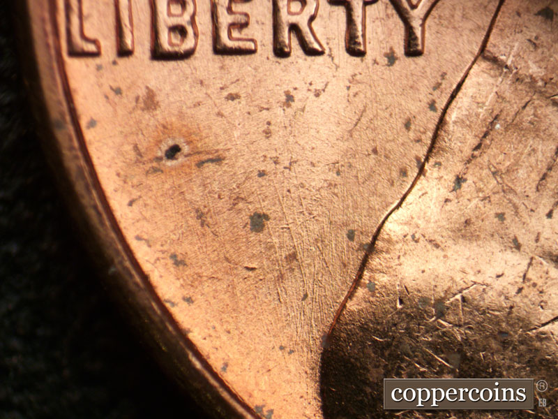 Die-stage B marker on 1963P•1DO•029 (1963 Doubled Die Obverse).