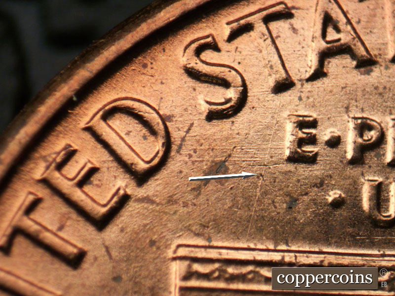 Die-stage B marker on 1963P•1DO•029 (1963 Doubled Die Obverse).