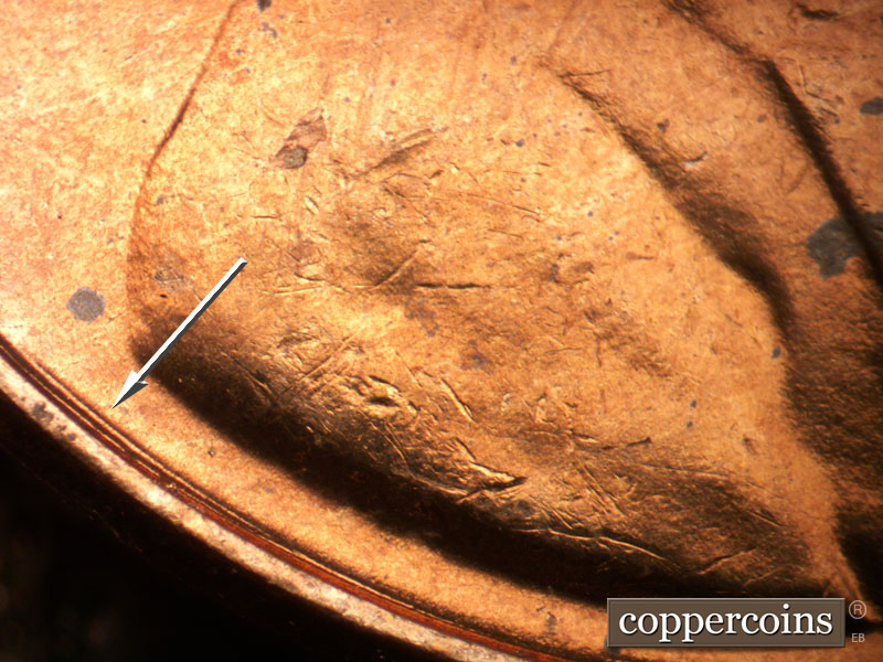 Die-stage B marker on 1963P•1DO•030 (1963 Doubled Die Obverse).