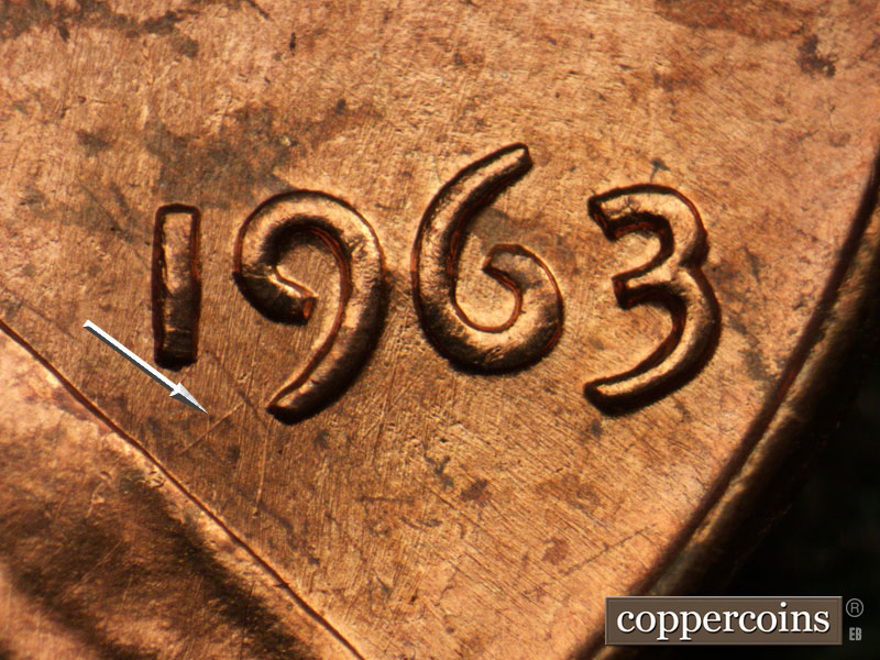 Die-stage B marker on 1963P•1DO•032 (1963 Doubled Die Obverse).