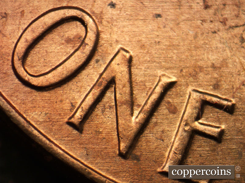 Die-stage B marker on 1963P•1DO•032 (1963 Doubled Die Obverse).