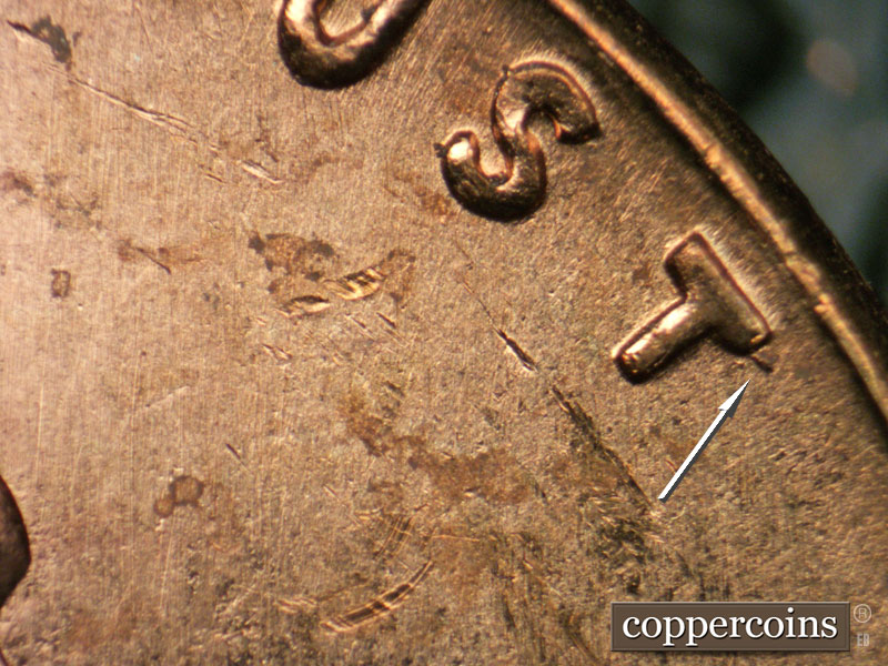 Die-stage B marker on 1963P•1DO•033 (1963 Doubled Die Obverse).