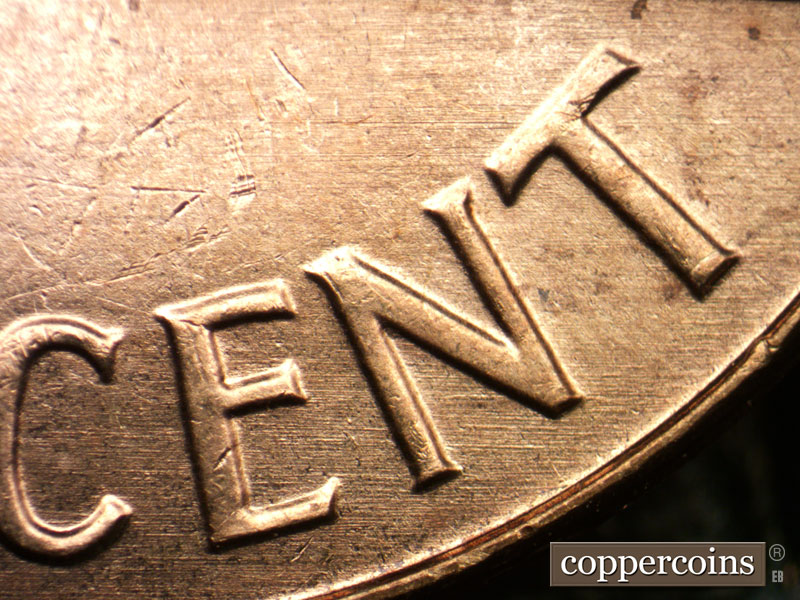 Die-stage B marker on 1963P•1DO•033 (1963 Doubled Die Obverse).