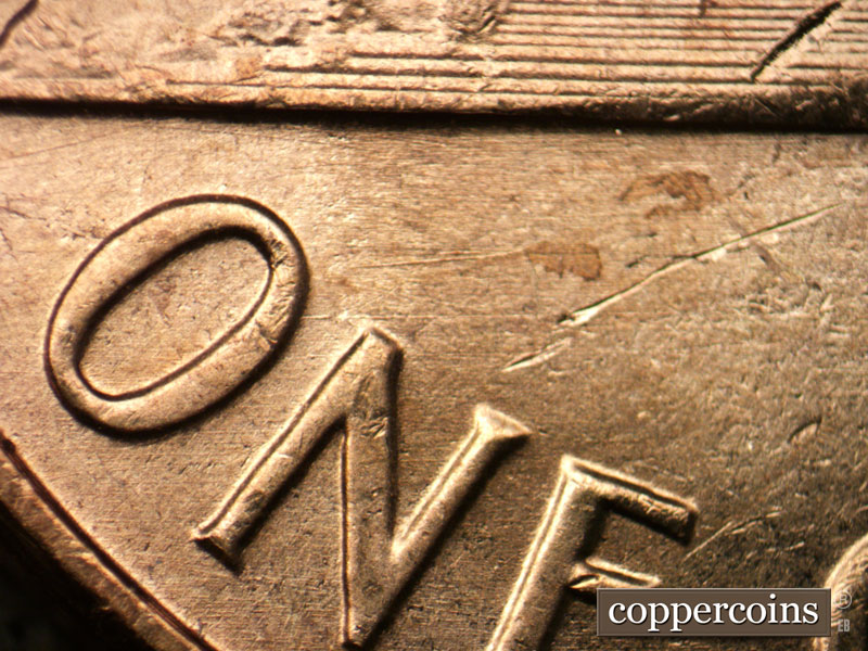 Die-stage B marker on 1963P•1DO•033 (1963 Doubled Die Obverse).