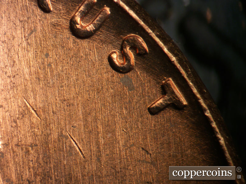 Die-stage B marker on 1963P•1DO•034 (1963 Doubled Die Obverse).